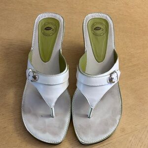 White Leather Women's Sandals by Nurture. Comfortable thong design. Kitten heel.